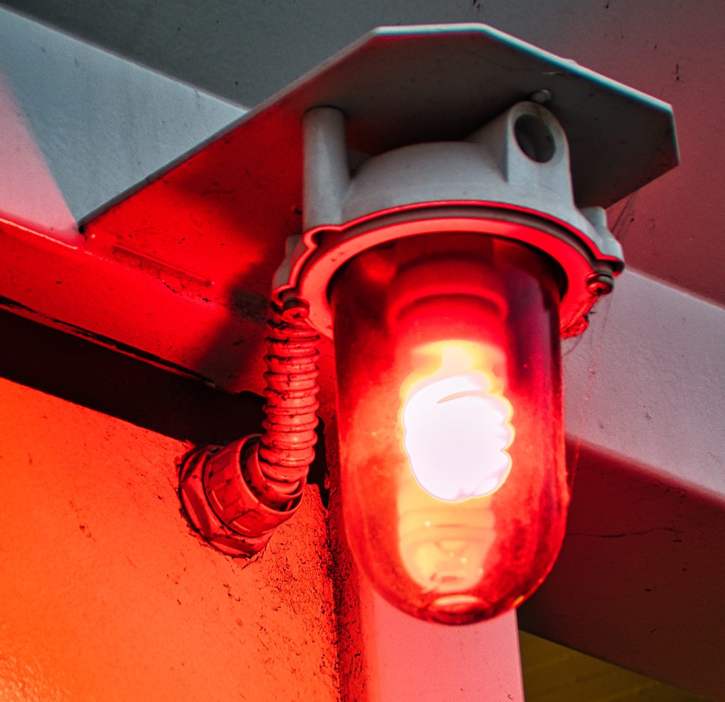 white and red gate arm at modern parking area